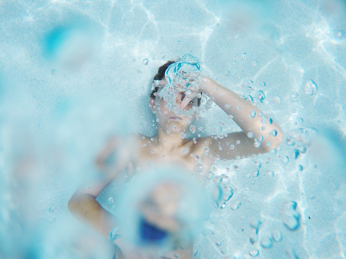 Boy Holding Breath Under Water